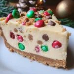 M&M Christmas Cookie Dough Cheesecake